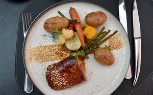 The pork fillet glazed in soy sauce was a daily special on Aug. 27, 2024, at  L'intuition in Houdeng-Aimeries, Belgium. Served with the meat was a medley of vegetables that included potatoes, cauliflower, green beans, tomato, radish and a carrot.