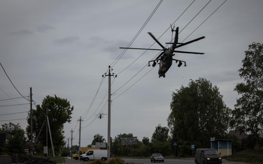 Ukrainian attack helicopters return to Kharkiv from a sortie north of the city on May 17. 