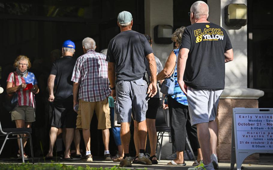 Voters line up to cast ballots in early voting in Daytona Beach.