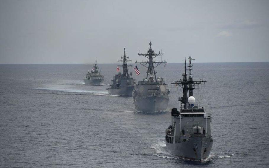 The Philippines’ patrol ship BRP Andres Bonifacio leads the destroyer USS Ralph Johnson, the Japanese ship JS Kirisame and the Canadian frigate HMCS Montreal in the Philippine Sea during a two-day exercise June 16, 2024.