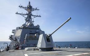 The guided-missile destroyer USS Ralph Johnson steams in the South China Sea on Aug. 22, 2024.