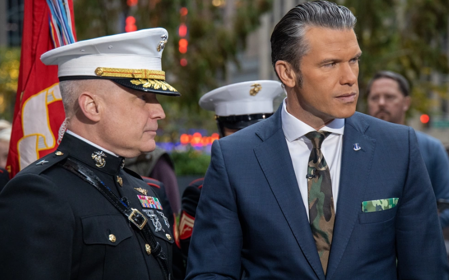 U.S. Marine Corps Brig. Gen. David Walsh, Commander of Marine Corps System Command and native of Brooklyn, New York, and Pete Hegseth, a fox and friends co-host, conduct a cake cutting ceremony