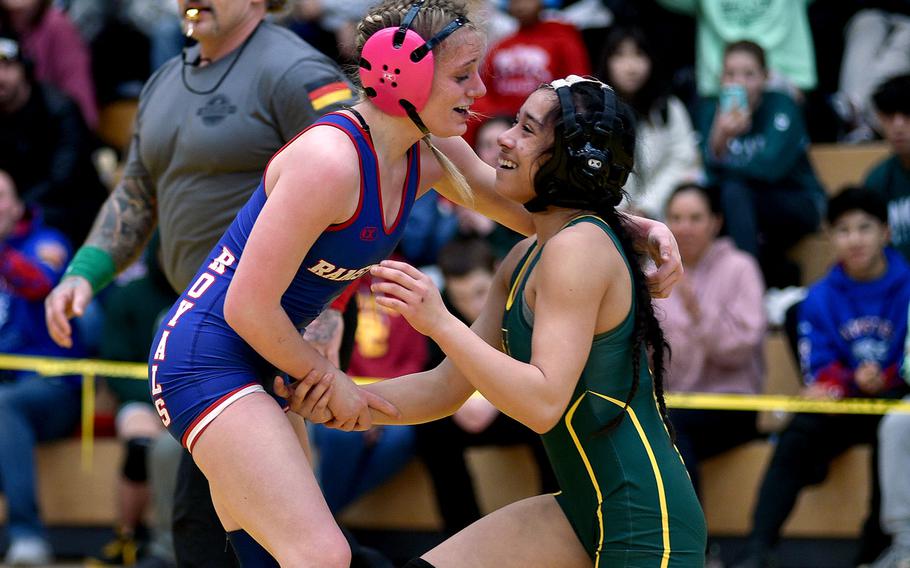 Lilliana Green and Maya Reyes embrace following their match.