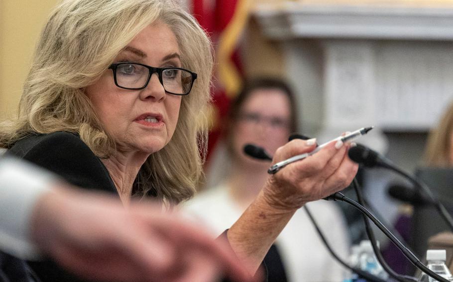 Blackburn sitting and commenting at the hearing.