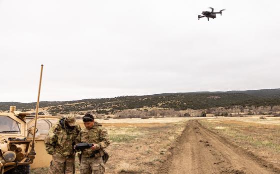 Soldiers from 10th Special Forces Group (Airborne) fly a drone for aerial surveillance at Fort Carson, Colorado, April 18, 2024. The use of drones enables 10th SFG(A) to conduct real time surveillance and mark targets for assaulters on the ground. 