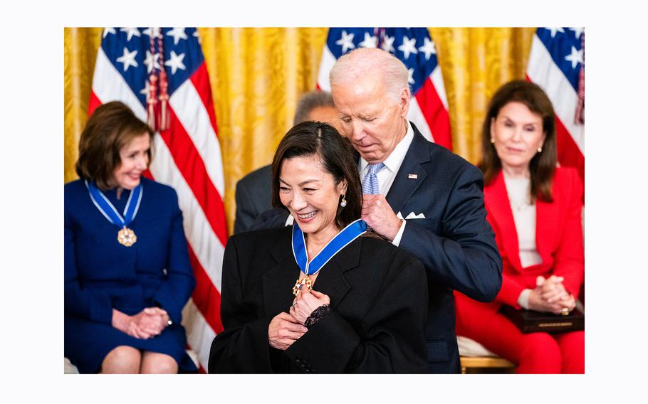Oscar-winner Michelle Yeoh receives the nation’s highest civilian honor from President Joe Biden during the Presidential Medal of Freedom ceremony at the White House on Friday, May 3, 2024.