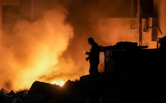 Flames and smoke rise after an Israeli airstrike in Beirut.