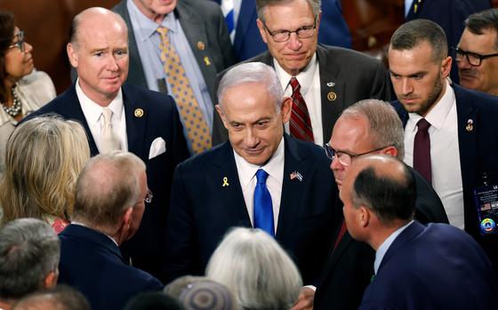Israeli Prime Minister Benjamin Netanyahu, middle, departs after addressing a joint meeting of Congress in the chamber of the House of Representatives at the U.S. Capitol on Wednesday, July 24, 2024, in Washington, D.C. (Anna Moneymaker/Getty Images/TNS)