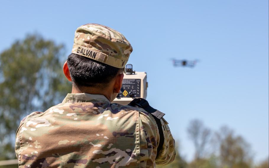 A drone approaches Spc. Edgar Galvan as he operates a Dronebuster in Boleslawiec, Poland, on May 15, 2024. 