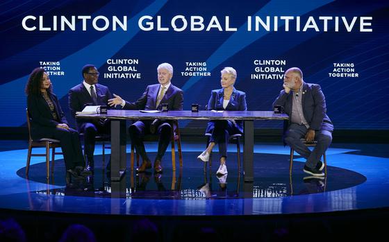 FILE -Bill Clinton, third left, speaks as Cindy McCain, Executive Director, World Food Programme, second right, Jose Andres, Founder and Chief Feeding Officer, World Central Kitchen, right, President of the Republic of Malawi, Lazarus Chakwera, second left, and Louise Emmanuelle Mabulo, Founder, The Cacao Project, left, listen during the Clinton Global Initiative, Sept. 19, 2023 in New York. (AP Photo/Andres Kudacki, File)