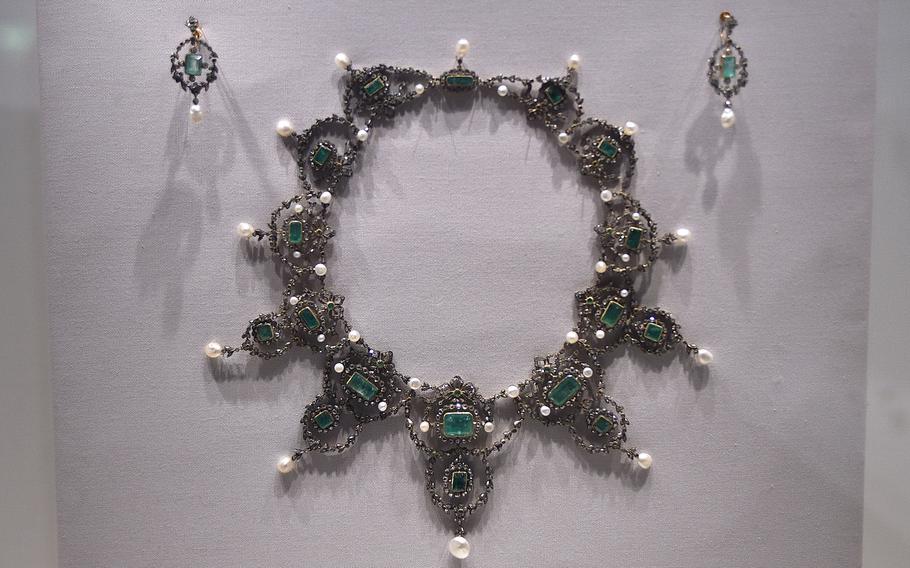 Matching pieces of a parure made of silver, gold, emeralds, diamonds and pearls made in Paris around 1980 at the Pforzheim Jewelry Museum in Pforzheim, Germany.