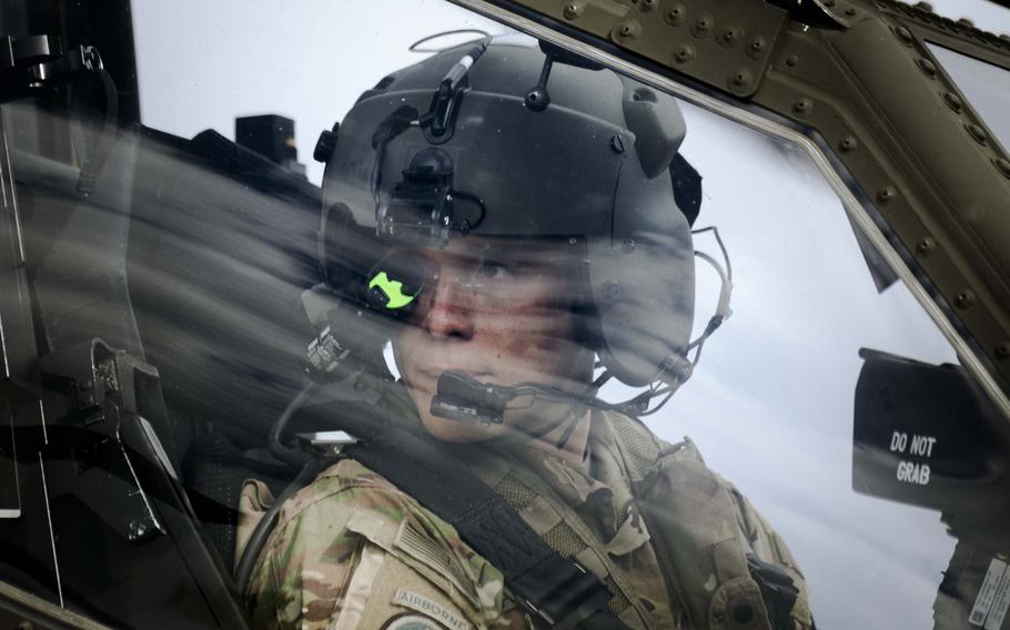 An Army Apache pilot with the 12th Combat Aviation Brigade idles at a refueling point before conducting live-fire training at Grafenwoehr Training Area in Germany, on Sept. 24, 2024. 