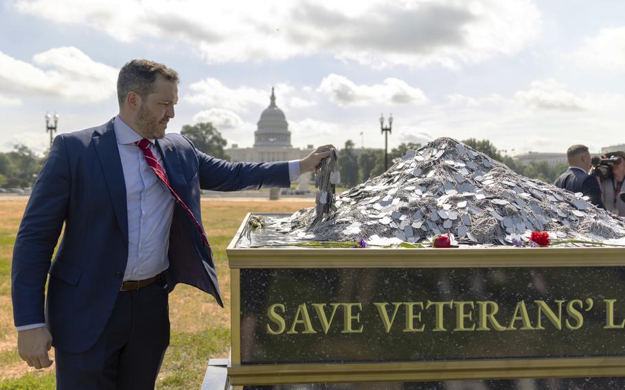 A pile of dog tags signifying veterans who have died to suicide