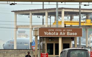 A sign for Yokota Air Base is shown.