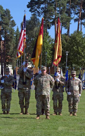 An Army honor guard stands at attention during a change of command ceremony at Tower Barracks in Grafenwoehr, Germany, on Aug. 6, 2024. Col. Stephen Flanagan assumed command of U.S. Army Garrison Bavaria from Col. Kevin Poole. 