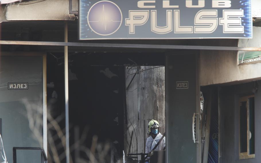 A firefighter inspects a nightclub