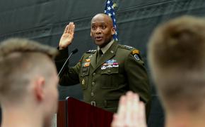 Lt. Gen. Xavier Brunson, commander of America’s First Corps, presents the oath of enlistment to eighteen high school military recruits during a ceremony at Saint Martin University, Lacey, Wash., May 3, 2022. “You are choosing to do something that not everybody will do,” said Brunson. “To know there are young men and women willing to serve their nation makes not only myself and your families proud, but your country as well.” (U.S. Army photo by Spc. Richard Carlisi, I Corps)