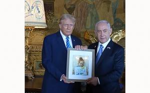 A video screen grab shows former President Donald Trump and Israeli Prime Minister Benjamin Netanyahu holding a framed picture at Trump’s Mar-a-Lago estate on Friday, July 26, 2024.