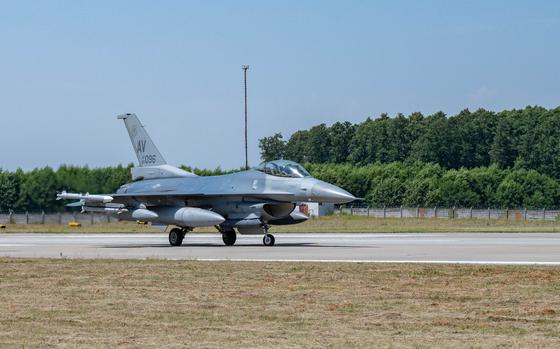 A U.S. Air Force F-16 Fighting Falcon, assigned to the 31st Fighter Wing, Aviano, Italy, arrives at Malacky Air Base, Slovakia, July 10, 2024. A total of two F-16’s teamed up with the 435th Air Ground Operations Wing to perform a certification test on a newly installed Barrier Arresting Kit-12. (U.S. Air Force photo by Airman 1st Class Eve Daugherty)