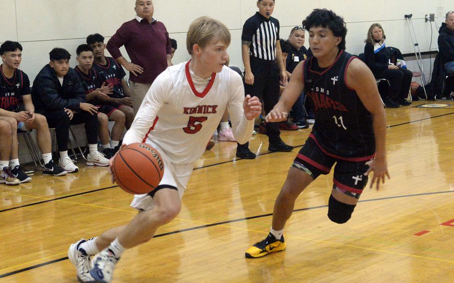 Gregor Tolar drives toward the basket.