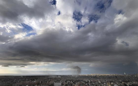 Smoke rises from buildings hit in Israeli airstrikes in Dahiyeh, in the southern suburb of Beirut.