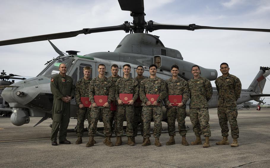 U.S. Marines of  Marine Medium Tiltrotor Squadron 262 (Rein.) photographed after an award ceremony on Marine Corps Air Station Futenma, Okinawa, Japan, Nov. 6, 2024.