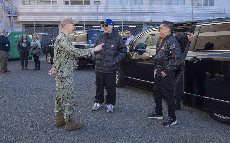 Jo Koy talks with a Navy sailor 