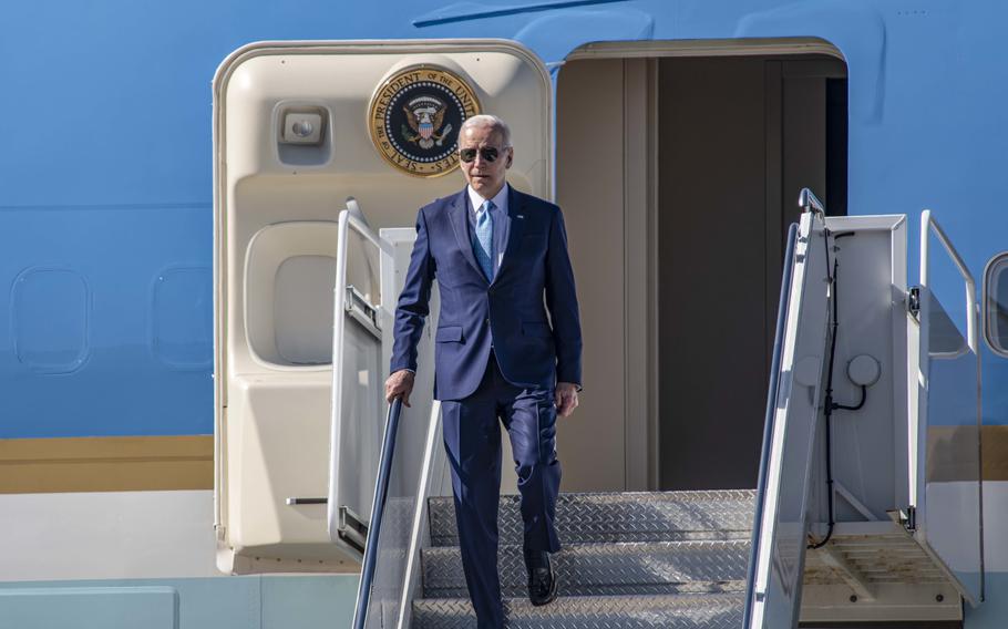 President Joe Biden disembarks Air Force One onboard Naval Air Station Oceana during a visit to Virginia Beach, Va., on Feb. 28, 2023.