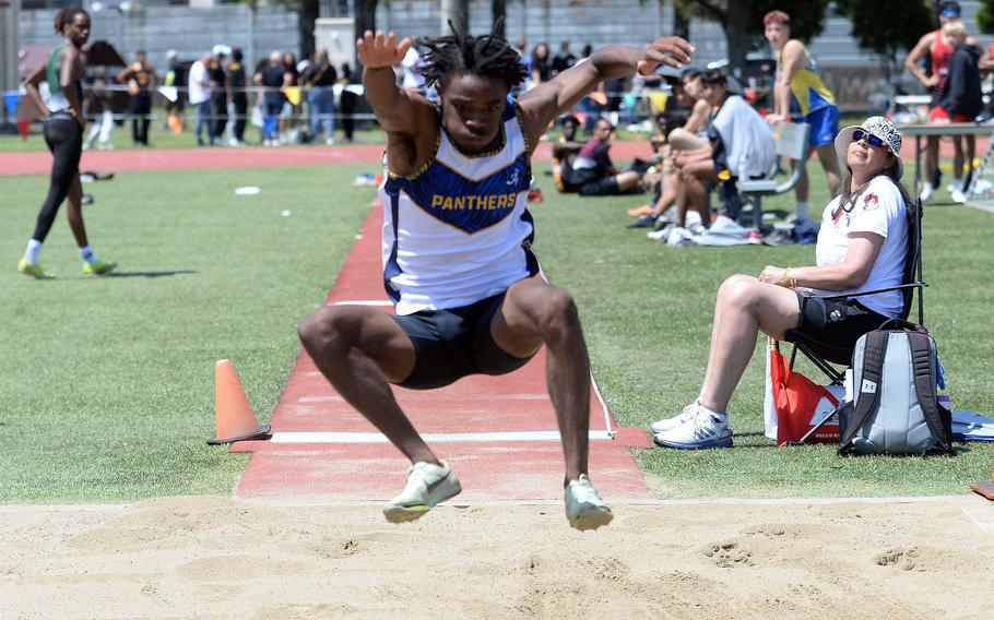 Guam High senior Aaron Johnson played football and basketball and also set a Far East meet record in the long jump.