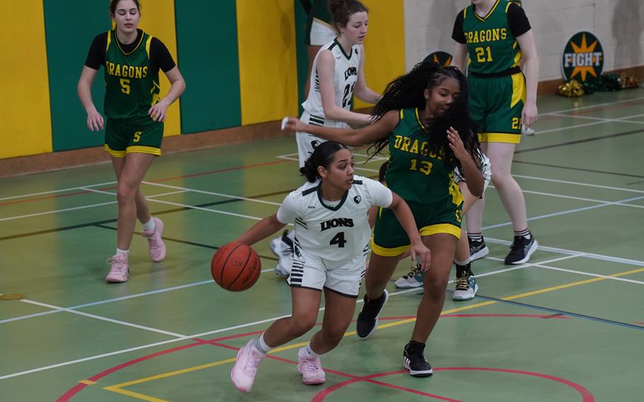 Selah Skariah dribbles up the court.