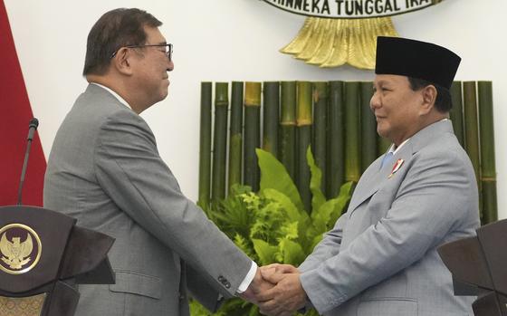 Indonesian President Prabowo Subianto, right, and Japan's Prime Minister Shigeru Ishiba attend a joint press conference after their meeting at Bogor Presidential Palace in Bogor, West Java, Indonesia, Saturday, Jan. 11, 2025. 