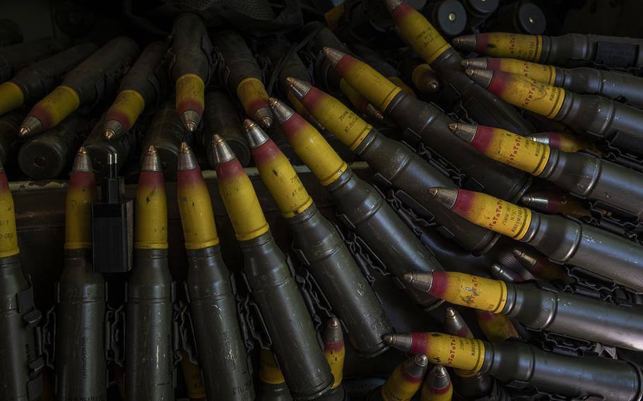 Rounds of 25mm ammunition lie on a seat in a U.S.-provided Bradley in southern Ukraine in 2023. 