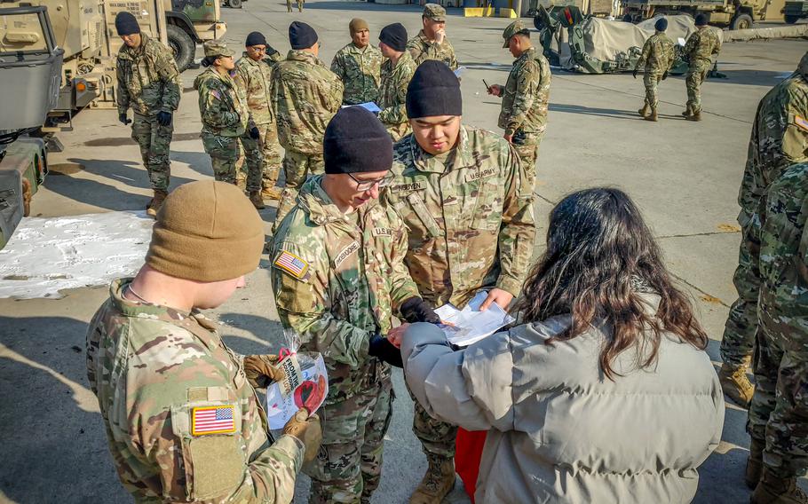 American soldiers receive Valentine’s Day cards.