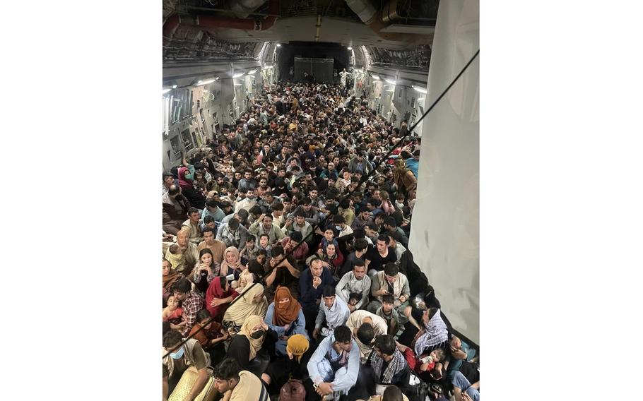 A U.S. Air Force C-17 Globemaster III transports over 820 Afghan citizens from Kabul’s Hamid Karzai International Airport in Afghanistan, Aug. 15, 2021. 