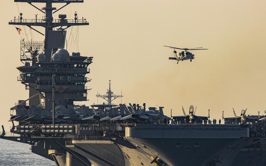 Components of the USS Dwight D. Eisenhower carrier strike group and a French navy ship transited the Strait of Hormuz in November 2023.