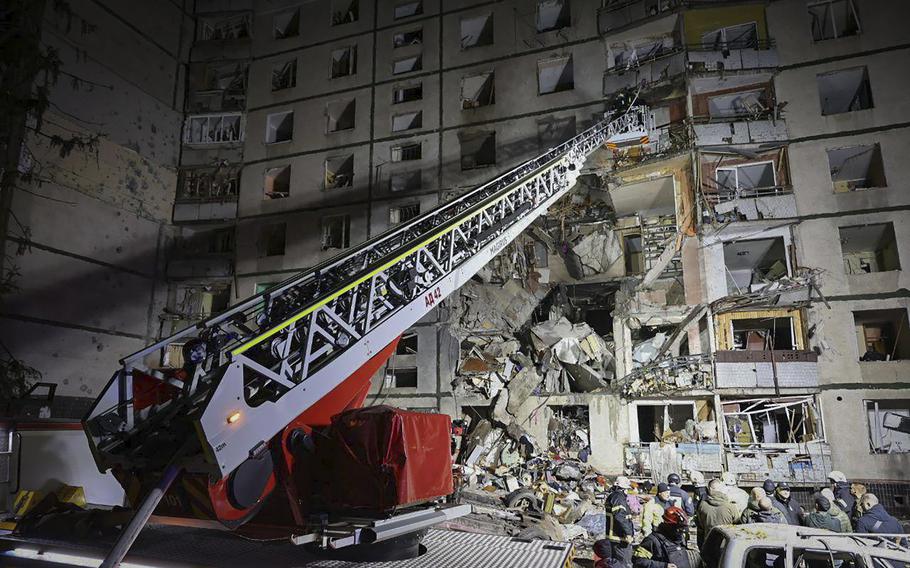  A multi-story apartment building is seen damaged