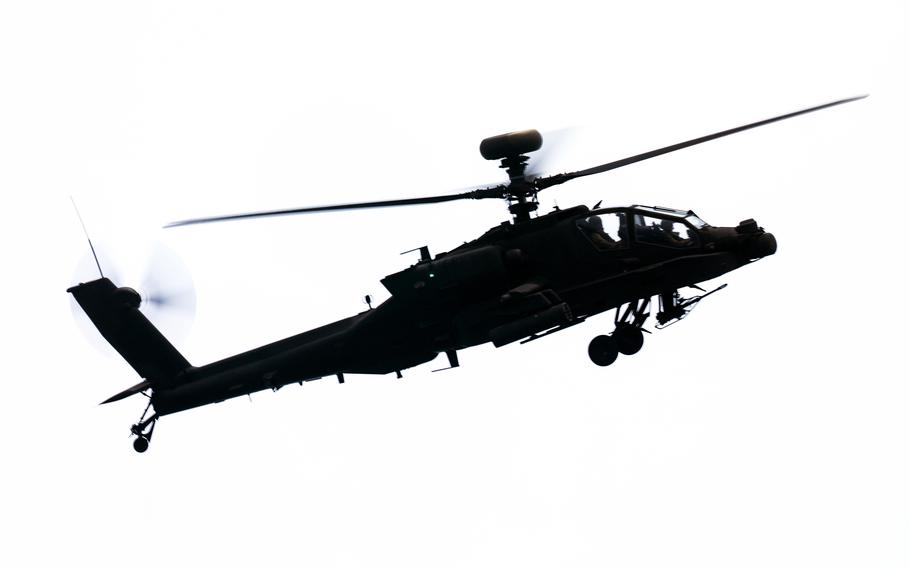 A U.S. Army AH-64E Apache attack helicopter trains over the Arabian Gulf in April 2020.