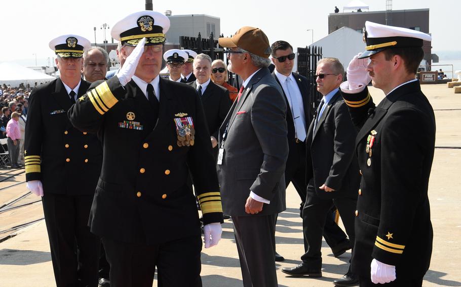 Robert Gaucher arrives to a commissioning ceremony