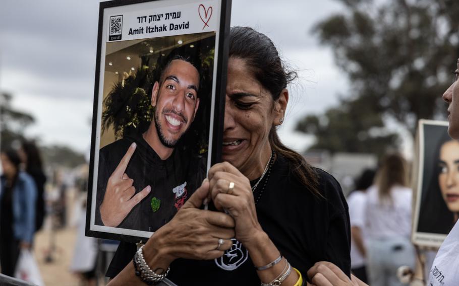 Friends and family members of those killed and abducted mark the anniversary of the Hamas attacks.