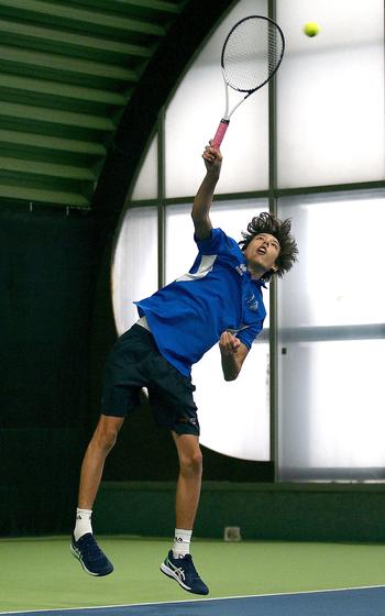 Giovanni La Piana serves.