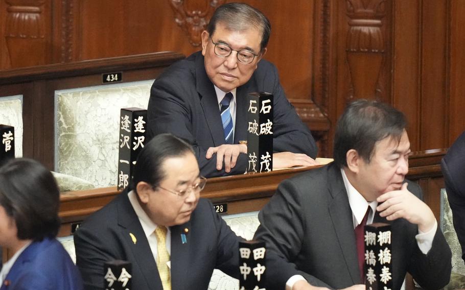 Shigeru Ishiba sits ahead of the extraordinary session of parliament’s lower house