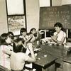 Seoul, South Korea, September 1959: Children carefully paint the features on puppets in one of the classroom of the Seoul Children's home. The girls live at the orphanage together with some 250 other war orphans. The home -- originally named Munske Orphanage and founded by Col. Charles A. Munske in July 1951 -- was set up with the aid of United States and United Nations servicemen for children often found wandering the battle fields. In 1952 the orphanage was nationalized under the Ministry of Health and Social Services and renamed. In 1955 the home was moved to its current location and the children were housed in tents until the new buildings were completed in August 1957.

Pictured here is a scan of the original 1959 print created by Stars and Stripes Pacific's photo department to run in the print newspaper. The red marks indicate the crop lines. Only the middle part of the image would appear in the newspaper. As the vast majority of pre-1964 Stars and Stripes Pacific negatives and slides were unwittingly destroyed by poor temporary storage in 1963, the prints developed from the late 1940s through 1963 are the only images left of Stripes' news photography from those decades – with the exception the negatives of some 190 pre-1964 photo assignment found recently. Stars and Stripes' archives team is scanning these prints and negatives to ensure their preservation. 

Stars and Stripes' Pacific archives house many images of South Korean children affected by the Korean War. Many are of orphans living in homes founded and/or funded by either U.S. servicemembers or the United Nations. Also found in our archives are images of so-called "Unit Mascots," children orphaned by the war who were "adopted" by U.S. military units. The children would live on base or in camp with the unit and were often outfitted in smaller versions of the unit's uniform. Some ended up being legally adopted by a servicemember and went on to live in America. 

Some of these images of "unit mascots" 