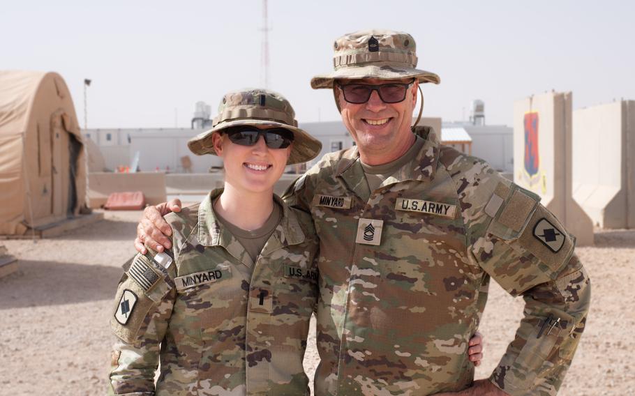 Army Master Sgt. Jason Minyard (right) and 1st Lt. Beth Minyard (left), 2nd Battalion, 153rd Infantry Regiment, pose for a photo June 16, 2023, at Prince Sultan Air Base in Saudi Arabia. The Minyards are a father and daughter duo given the opportunity to deploy and celebrate Father’s Day together.