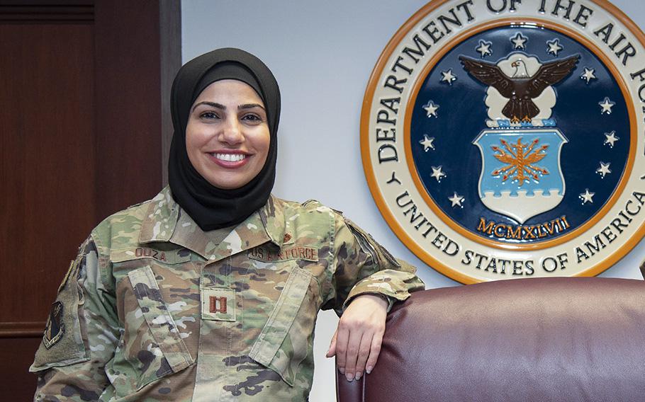 Capt. Maysaa Ouza, the first Air Force Muslim service member to wear a hijab while in uniform, stands in a courtroom at Wright-Patterson Air Force Base on May 20, 2021. 