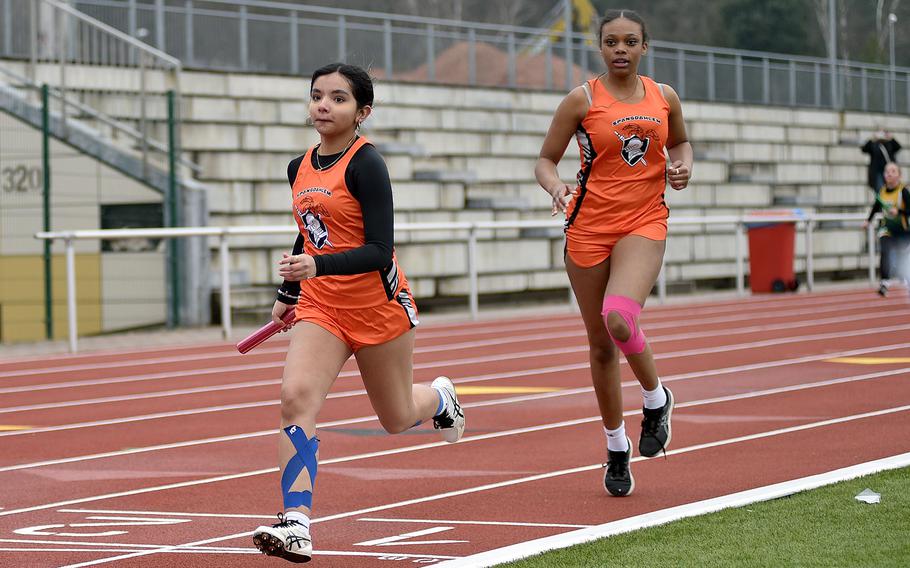 Alanis Figueroa begins her leg of a relay.