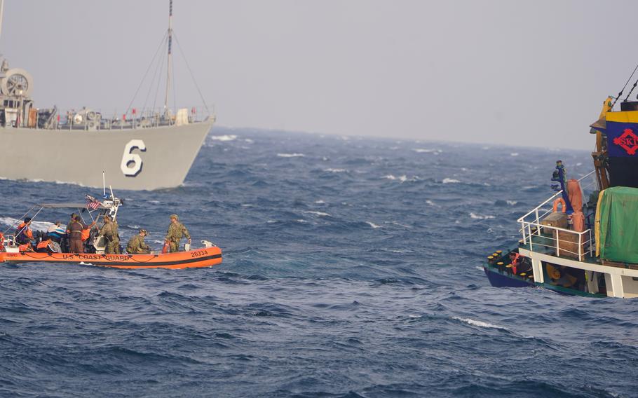 A U.S. Coast Guard team rescues seven mariners from a cargo ship.