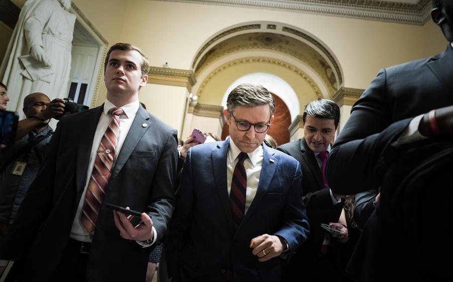 House Speaker Mike Johnson, R-La.. walks to the House floor on May 7. 