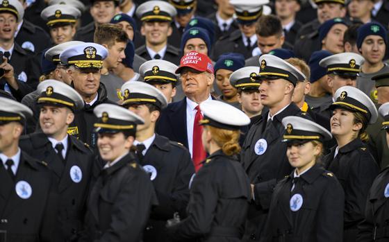 President Donald J. Trump stands with United States Naval Academy cadets during the 120th Army-Navy Game at Lincoln Financial Field in Philadelphia, Pa., Dec. 14, 2019. The United States Naval Academy defeated the United States Military Academy this year. (U.S. Army photo by Sgt. James Harvey)