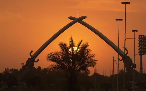 Sunrise over the Hands of Victory, 2004

Baghdad, Iraq, Jan. 17, 2004: Gigantic crossed sabers, held by giant hands representing the hands of former Iraqi leader Saddam Hussein, split the sky at sunset Saturday in Baghdad. The sabers form what is called the Victory Arch, which leads into parade grounds built by Saddam. The parade grounds honor the deaths of Iraqi soldiers during the Iran-Iraq war in the 1980s.

META TAGS: Operation Iraqi Freedom; Wars on Terror; 