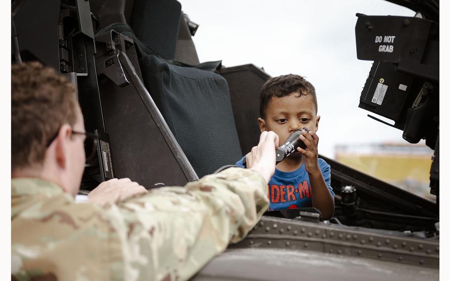 A local family takes a tour of a military vehicle at the 63rd Annual German-American Volksfest on Camp Algiers, Grafenwoehr, Germany from August 2-4, 2024. 